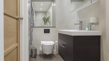 Hair dryer, towels, soap, toilet paper