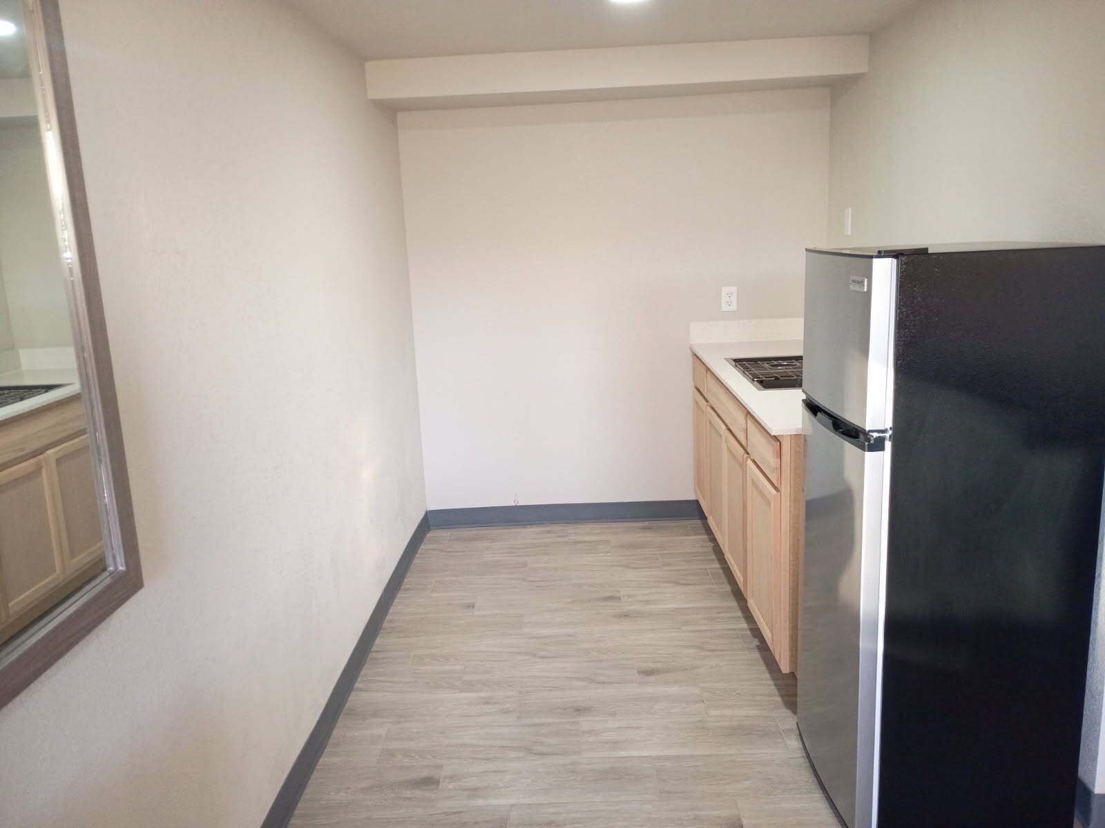 Deluxe Room | Private kitchen | Full-size fridge, microwave