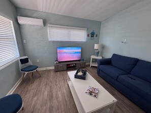 Smart TV, books - Penguins on the Beach | 1BR Surf Shack Steps to Beach & Downtown w/pool | Unit D (Cocoa Beach)