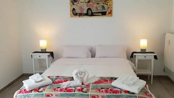 2 chambres, fer et planche à repasser, Wi-Fi, draps fournis