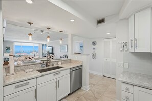 Fridge, microwave, oven, stovetop - Waterfront Isla del Sol Condo w Balcony & Pool (St Petersburg)