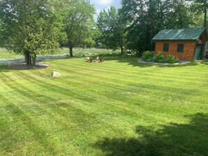 Property grounds - Luxurious Lakefront Log Home with Private Dock and fenced in yard (Augusta)