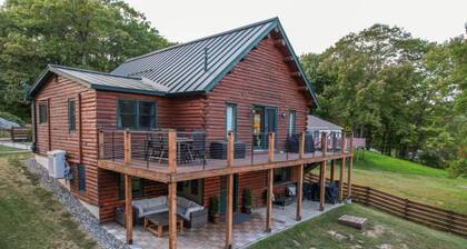 Luxurious Lakefront Log Home with Private Dock and fenced in yard