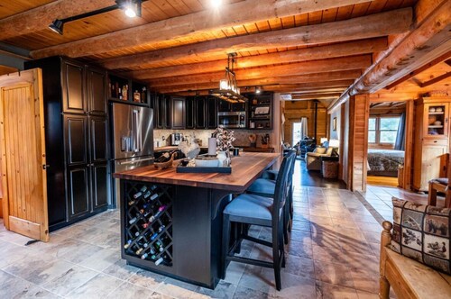 Luxurious Lakefront Log Home with Private Dock and fenced in yard