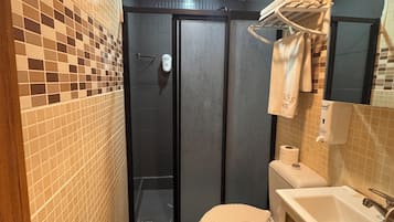 Economy Double Room | Bathroom | Shower, rainfall showerhead, hair dryer, slippers