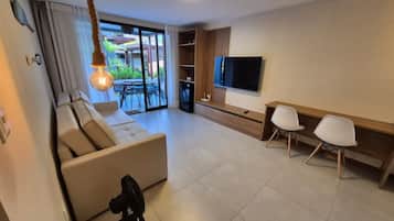 Apartamento básico | Área de estar | Smart TV 32 polegadas com canais digitais