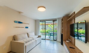 Basic Apartment | Living area | 32-inch Smart TV with digital channels - Apt in Condo w/ Pool 350m From the Beach Pll0004 (Camaçari)