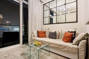 Living area - Canal Side 1BR with Private Terrace + Parking (Dubai)