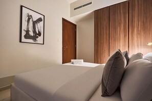 Iron/ironing board, WiFi, bed sheets - Canal Side 1BR with Private Terrace + Parking (Dubai)