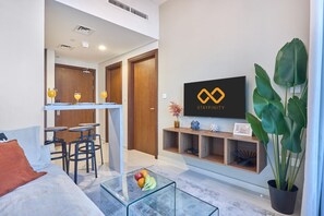 Living area - Canal Side 1BR with Private Terrace + Parking (Dubai)