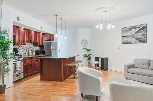 Comfort Apartment | Living area | 50-inch Smart TV with digital channels