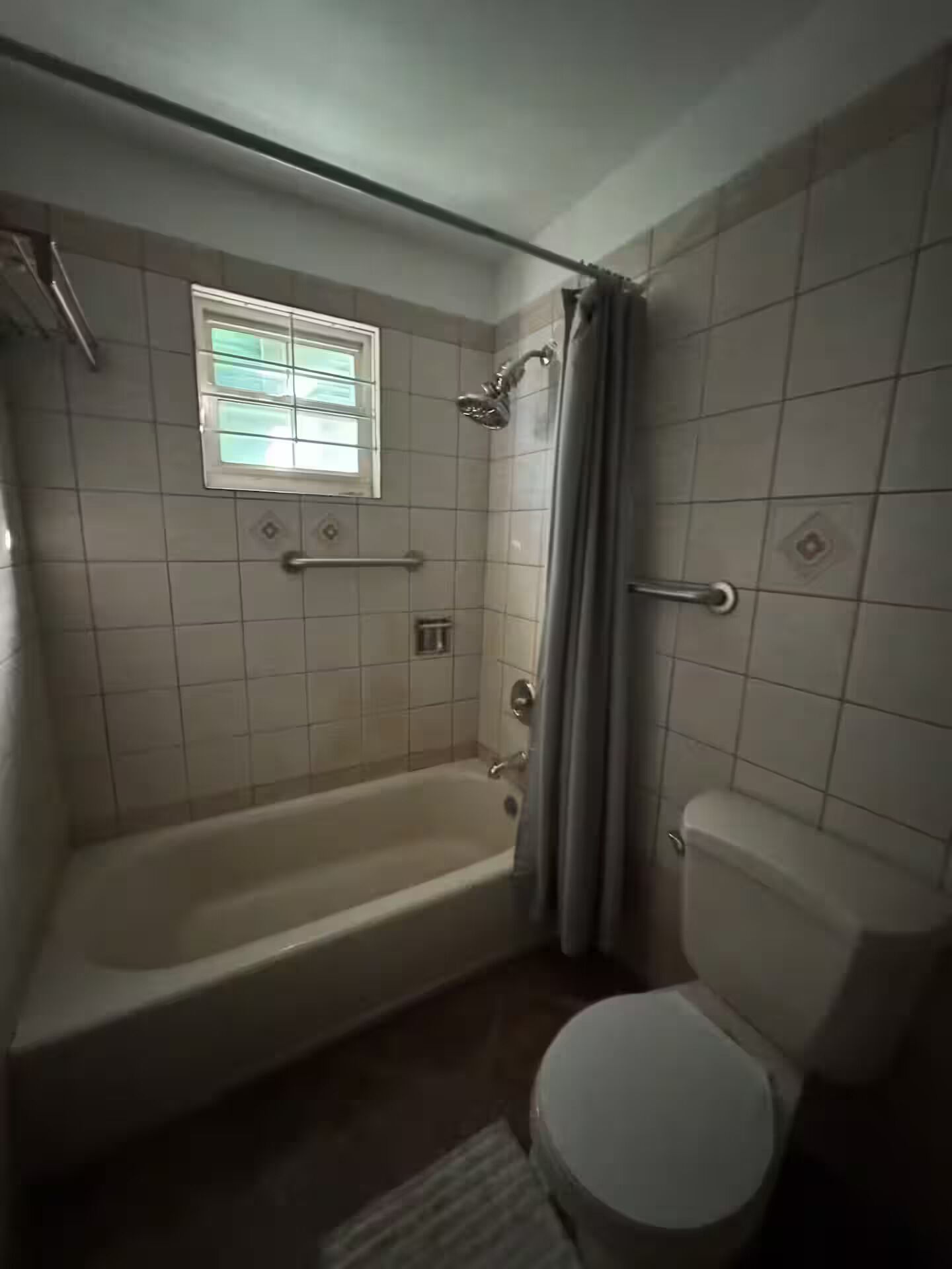 Shower, towels, soap, toilet paper