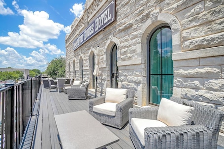 Terrace/patio. Granbury Hotel Room right on the Historic Granbury Square