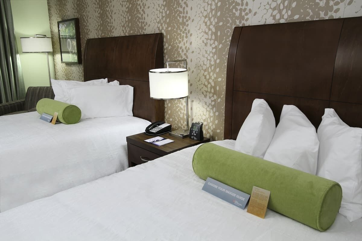 Sink into soft pillows and fresh bedding for instant comfort.