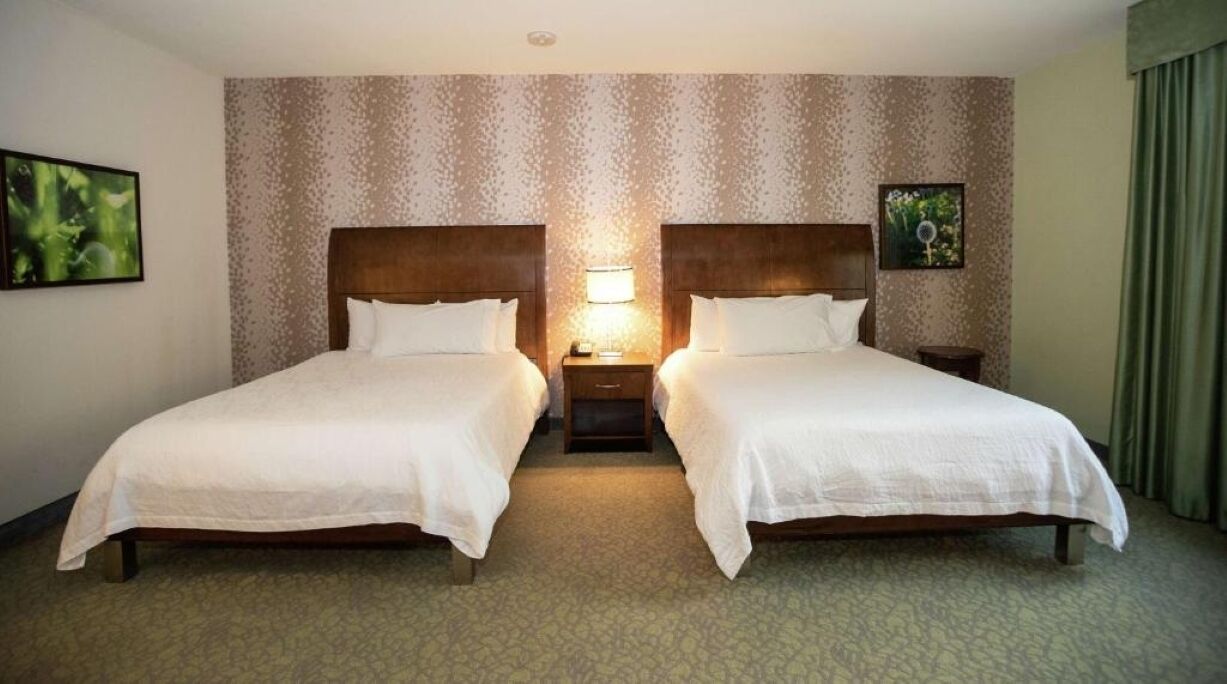 Unwind in crisp linens with a spacious two-bed layout.