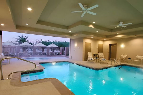 Unwind in the sparkling indoor pool after a busy day.