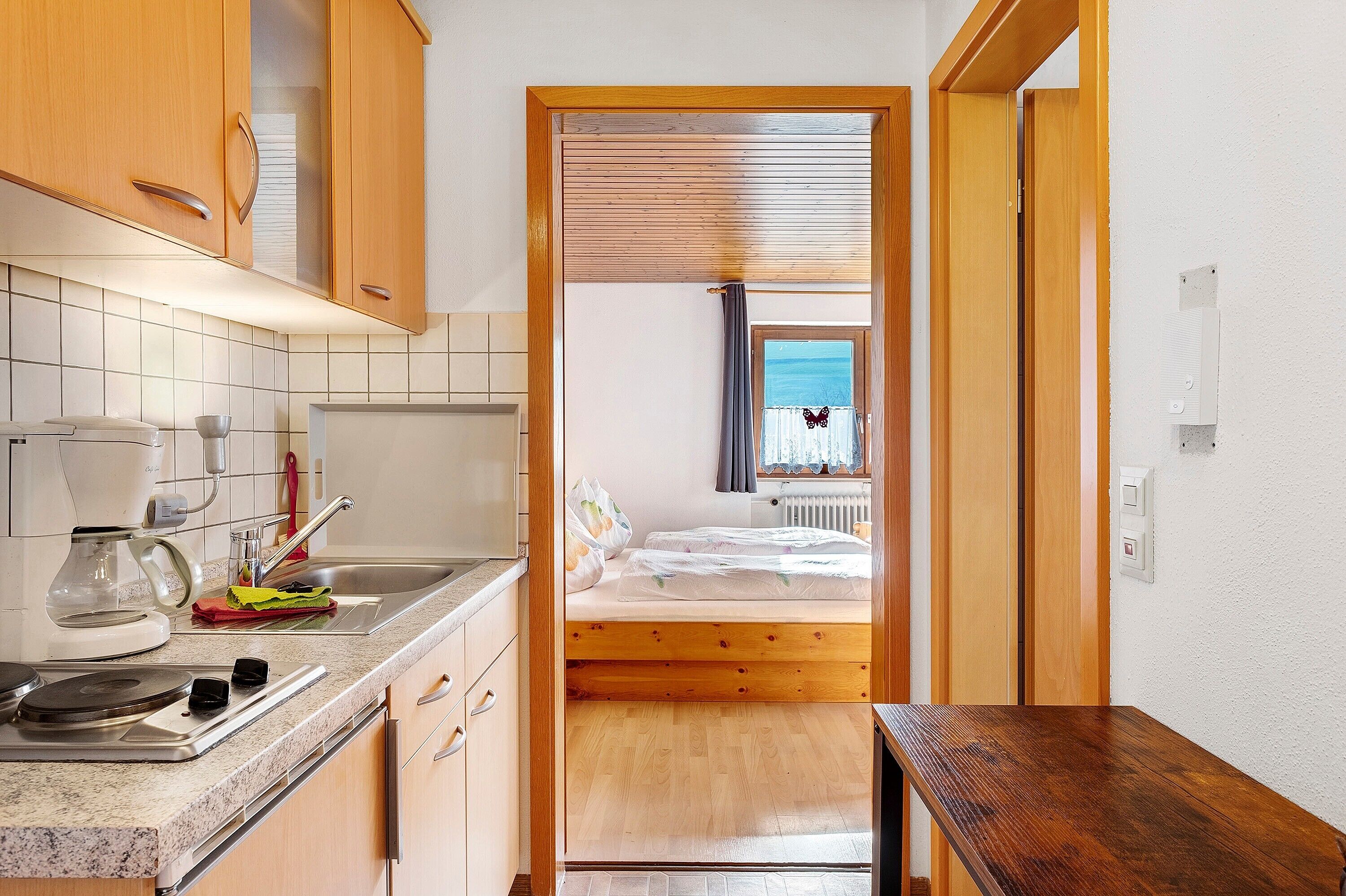 Fridge, stovetop, coffee/tea maker, electric kettle