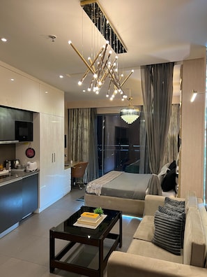 Business Apartment, City View | Living area - 41 Floor River View - TheRoomeraStay (Noida)