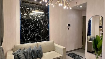 Business Apartment, City View | Living area