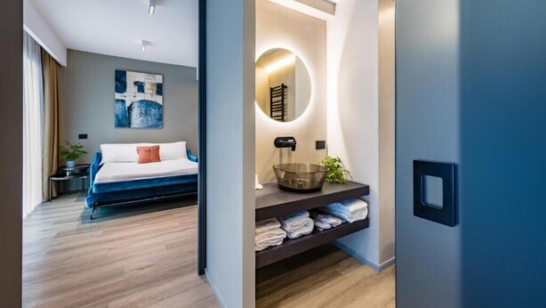 Junior Suite, Balcony, City View 101 | Bathroom | Free toiletries, hair dryer, bathrobes, slippers - MH SUITES PLEBISCITO (Naples)