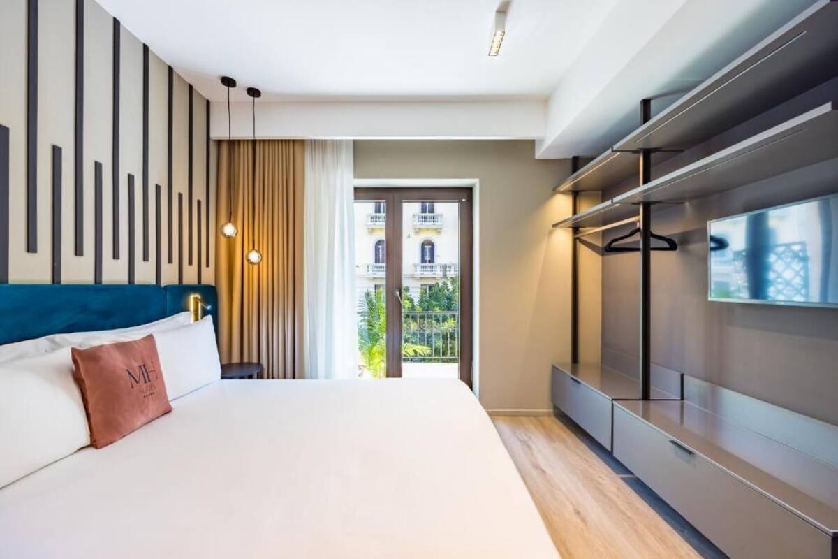 Junior Suite, Balcony, City View 101 | In-room safe, laptop workspace, blackout drapes, soundproofing
