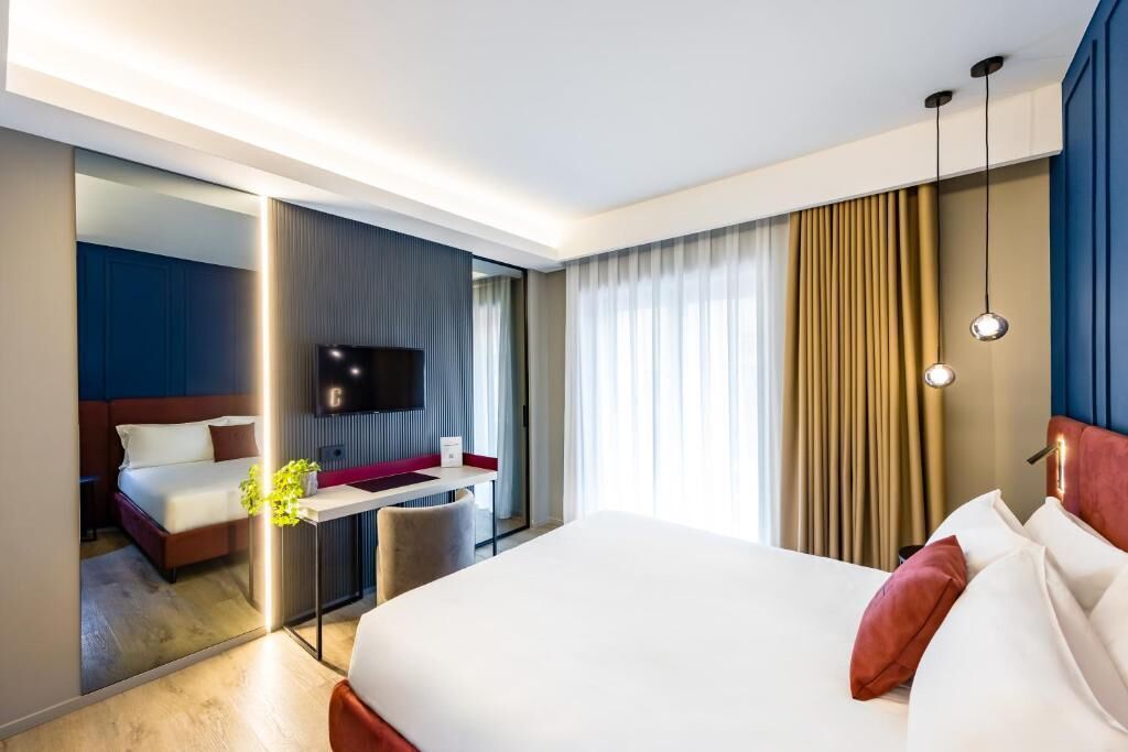 In-room safe, laptop workspace, blackout drapes, soundproofing