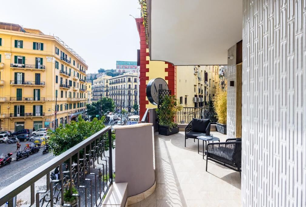 Suite junior, balcón, vistas a la ciudad | Jardines del alojamiento