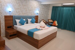 In-room safe, desk, laptop workspace, blackout curtains - Visthara Elite (Bengaluru)