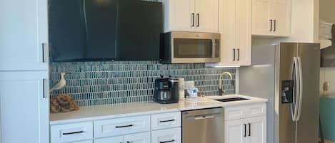 Fridge, microwave, dishwasher, coffee/tea maker