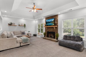 TV, fireplace, computer monitors - 3BR Modern Home Near LakePoint, KSU, Lakes, Trails (Acworth)