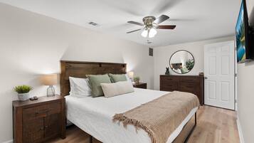 1 bedroom, desk, iron/ironing board, travel crib