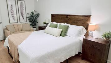 1 bedroom, desk, iron/ironing board, travel crib