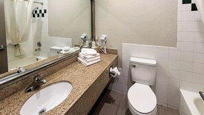 Combined shower/bathtub, hair dryer, towels, soap