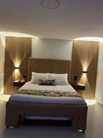 Deluxe Triple Room, 1 Bedroom, Garden View | Premium bedding, down comforters, in-room safe, desk