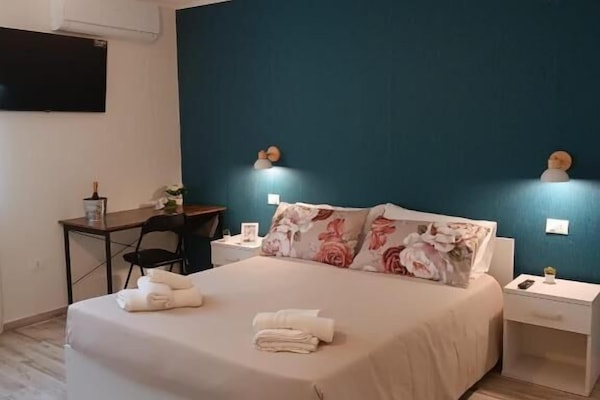 Kamar Quadruple Deluks | Meja kerja, ruang kerja ramah laptop, dan Wi-Fi gratis