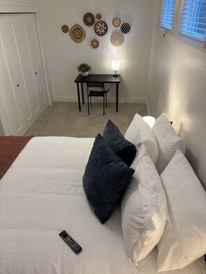 2 bedrooms, desk, iron/ironing board, travel crib