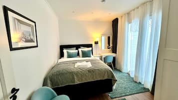 2 dormitorios, tabla de planchar con plancha, wifi gratis y ropa de cama