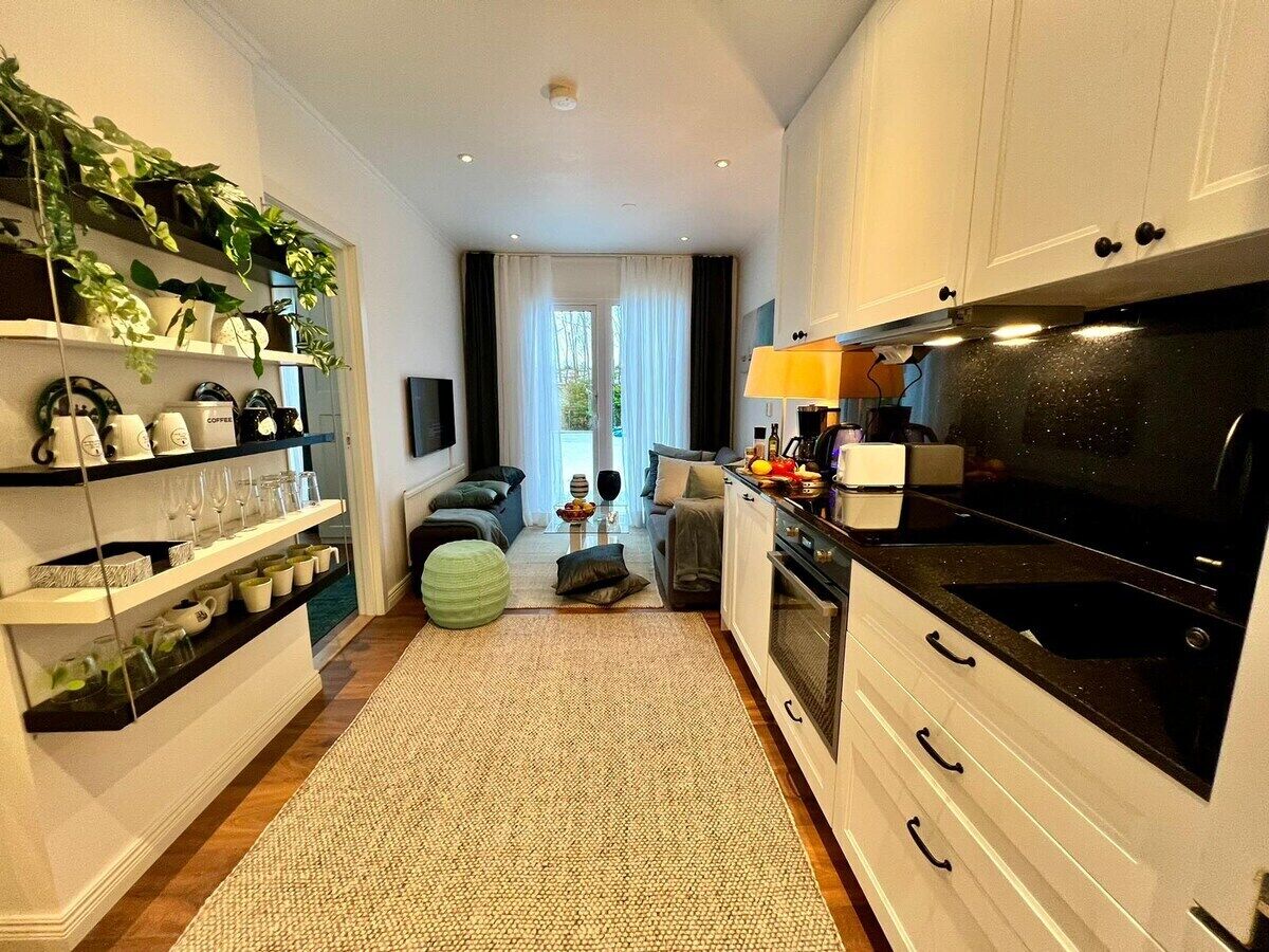 Frigorífico, microondas, horno y placa de cocina