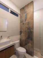 Family Quadruple Room, Pool View | Bathroom | Shower, hair dryer, towels, soap