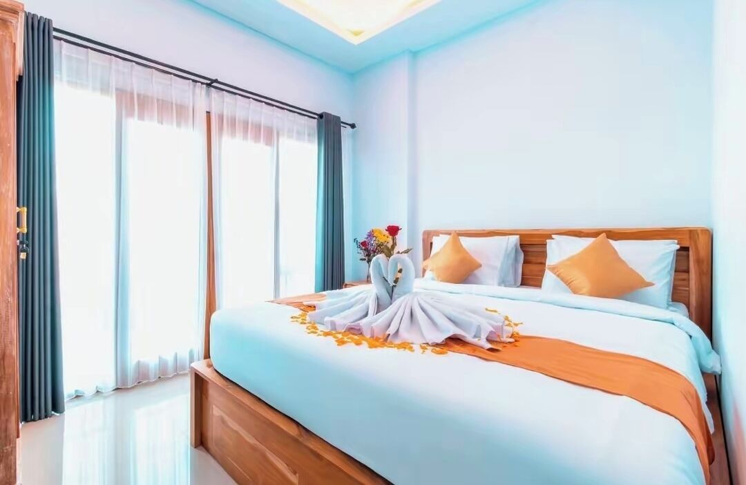 Premium bedding, blackout drapes, soundproofing, iron/ironing board