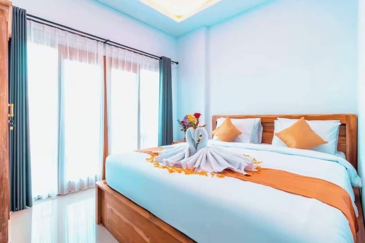 Premium bedding, blackout drapes, soundproofing, iron/ironing board