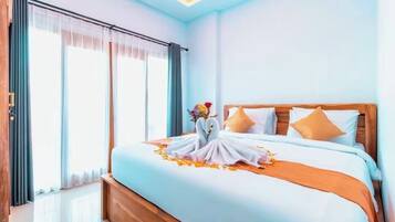 Premium bedding, blackout curtains, soundproofing, iron/ironing board