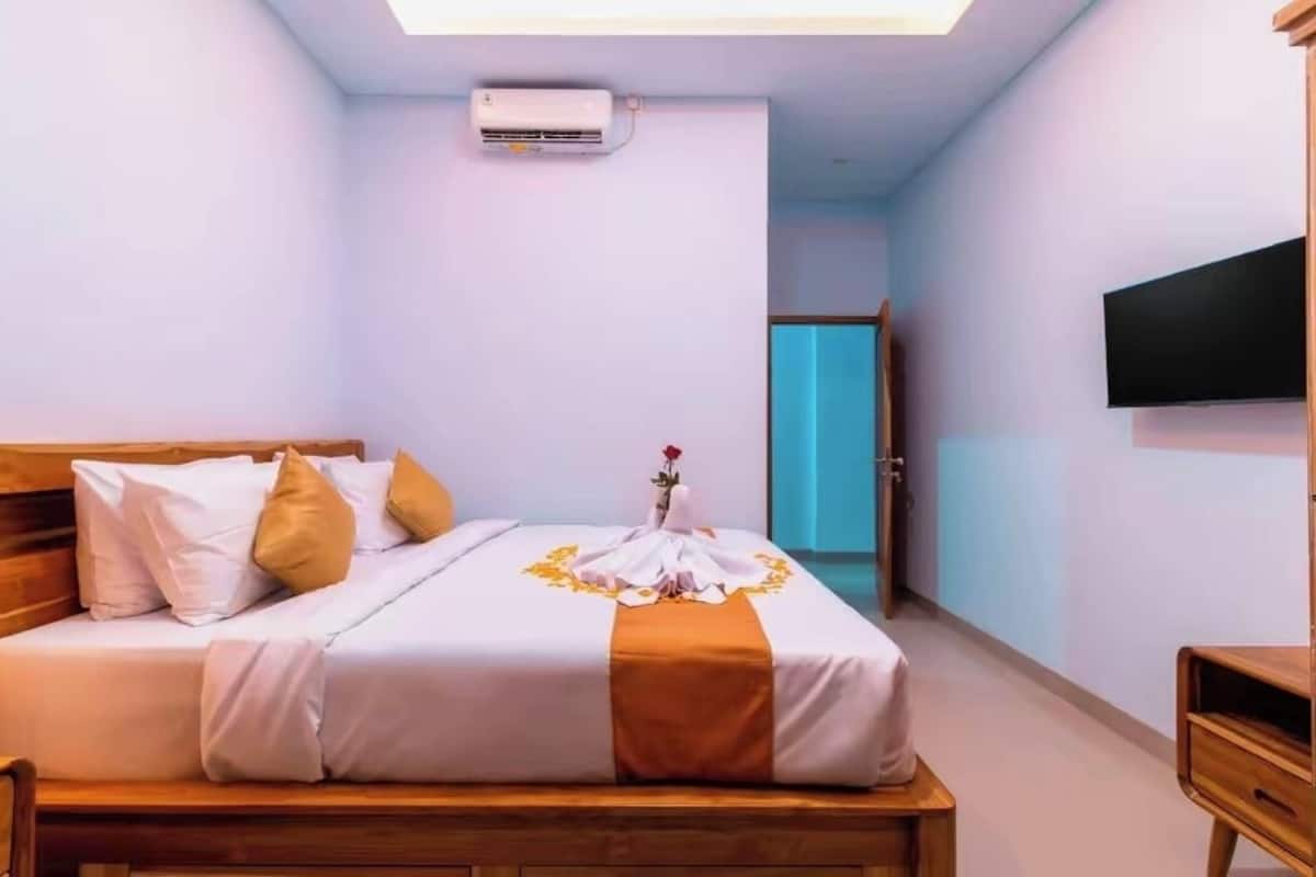 Premium bedding, blackout drapes, soundproofing, iron/ironing board