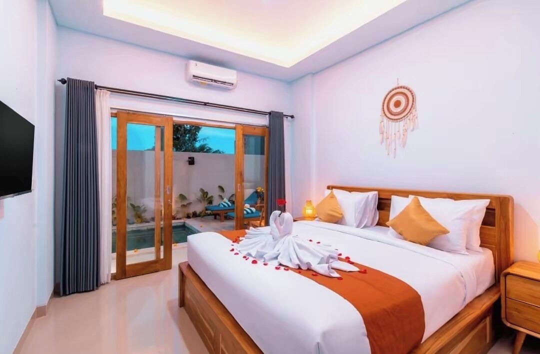 Premium bedding, blackout drapes, soundproofing, iron/ironing board