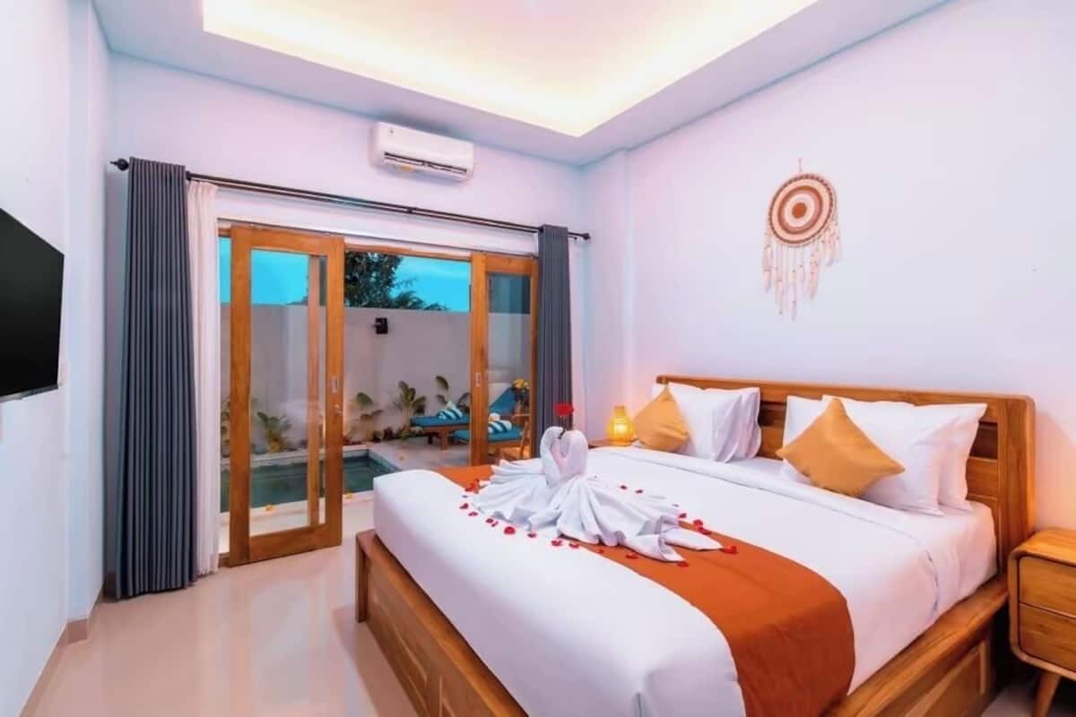 Premium bedding, blackout drapes, soundproofing, iron/ironing board