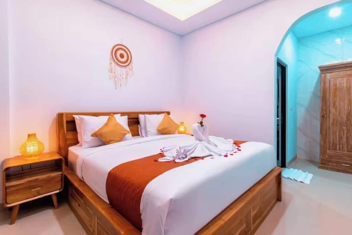 Premium bedding, blackout drapes, soundproofing, iron/ironing board