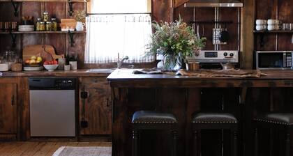 Cozy 3-bedroom cabin on a horse ranch where tranquility meets rustic charm!