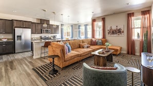 Living area - Dusty Sage Hollow ~ Hot Tub + Arcade + Fire Pit (Fernley)