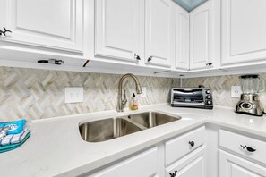 Apartment, Mehrere Betten (Dolphin Point 106C) | Eigene Küche