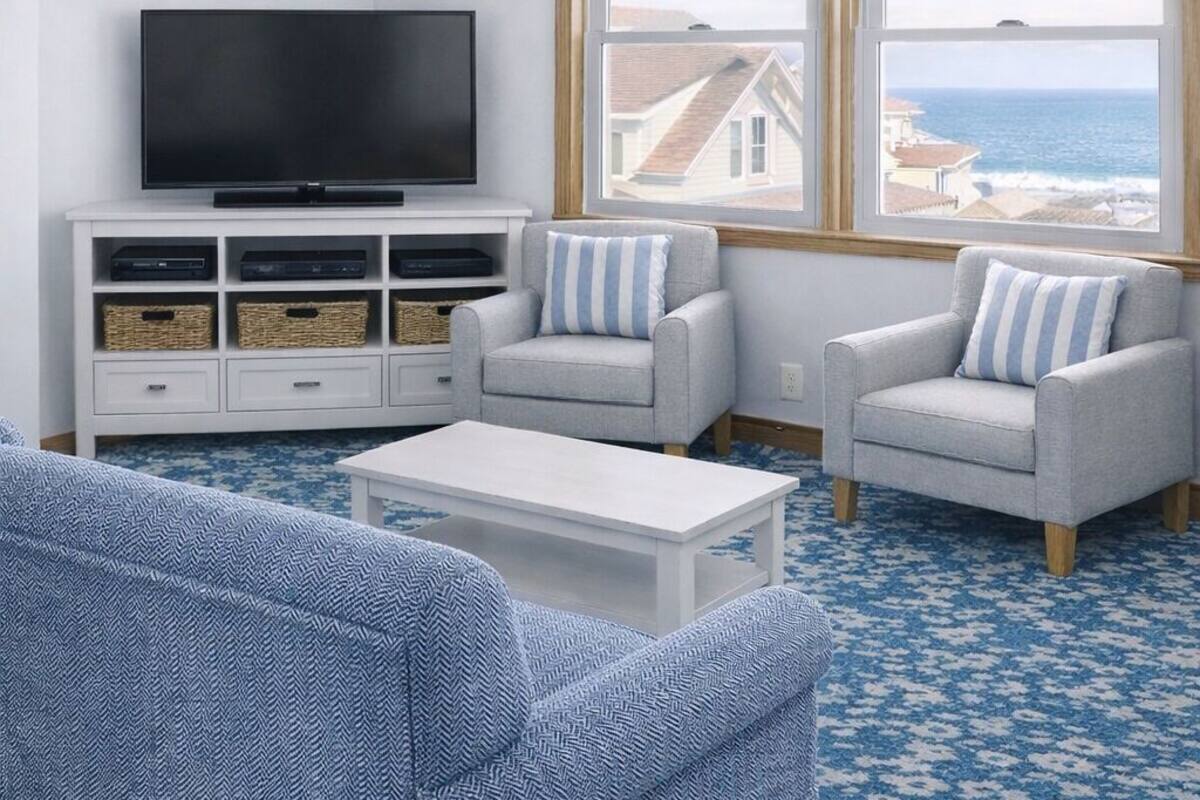 Deluxe Studio Suite, Partial Ocean View | Living area